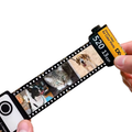 Foto-Filmrolle mit eigenen Bildern ausgezogen als persönliches Erinnerungsstück